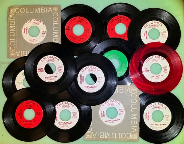 Collection of Columbia Records 45 RPM singles produced by John Simon